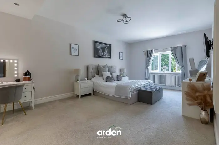 Principal bedroom with a fitted dressing table