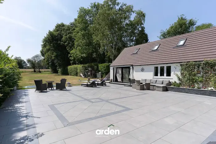 Porcelain terrace running the width of the house